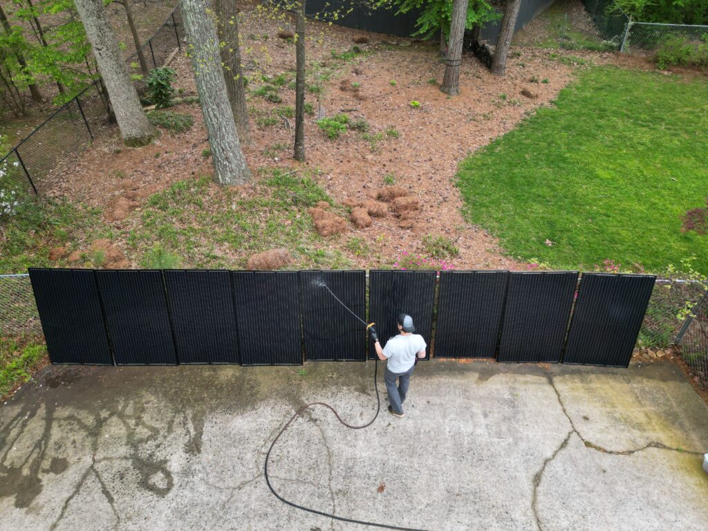 default Guy cleaning solar panels